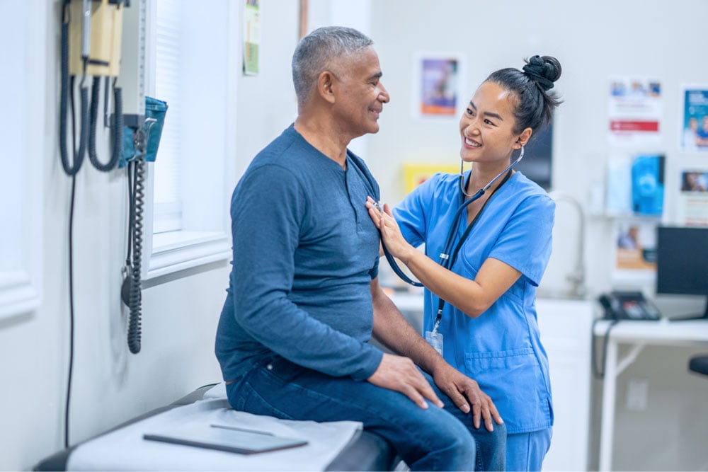 Doctor checking up on patient.